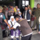 koma-calon haji kursi roda