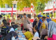 Temui Warga Pulau Pramuka, Wakapolda Metro Bagikan Bendera Hingga Tanam Pohon untuk Penghijauan