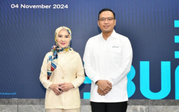 Nicke Widyawati dan Simon Aloysius Mantiri