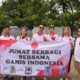 Jumat Berkah, GAMIS Indonesia Bagi-Bagi Ratusan Nasi Bungkus ke PKL, Ojol & Warga di Jaktim