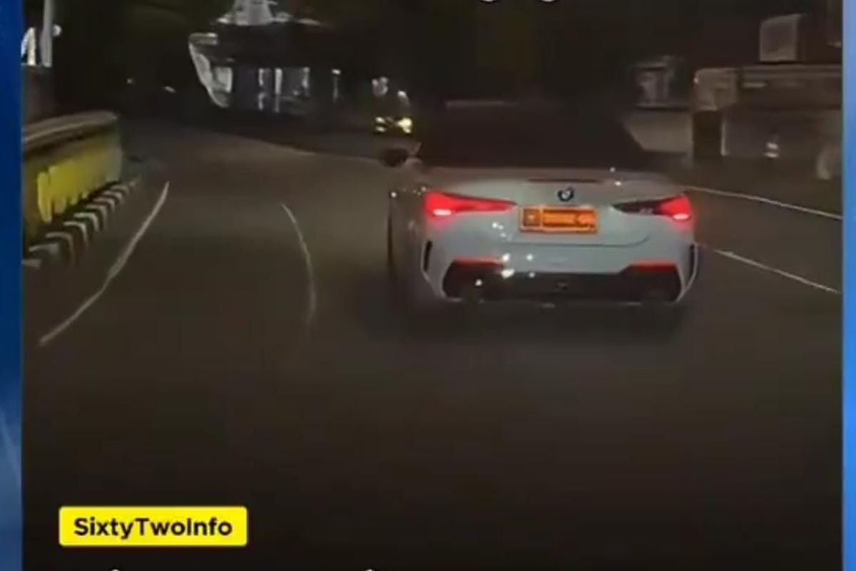 Viral BMW Pelat Dinas Merokok Saat Berkendara